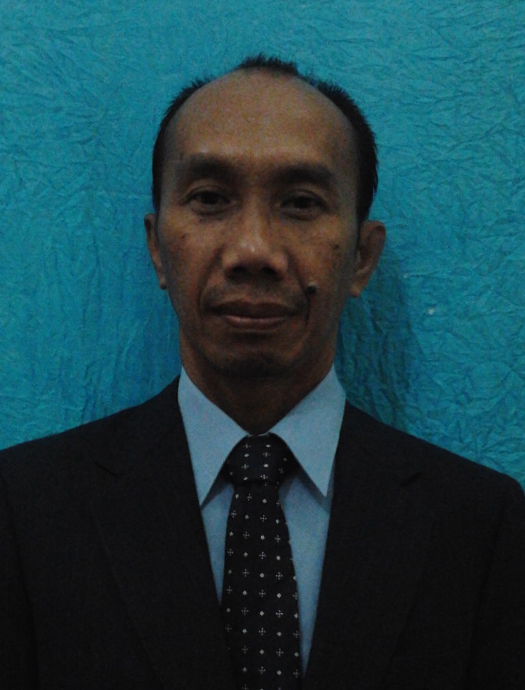 Drs. Nana Suryana M. Hum.